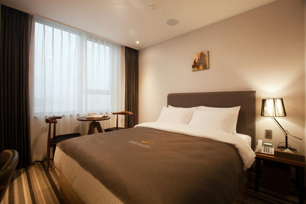 Gnb Hotel Busan Værelse billede